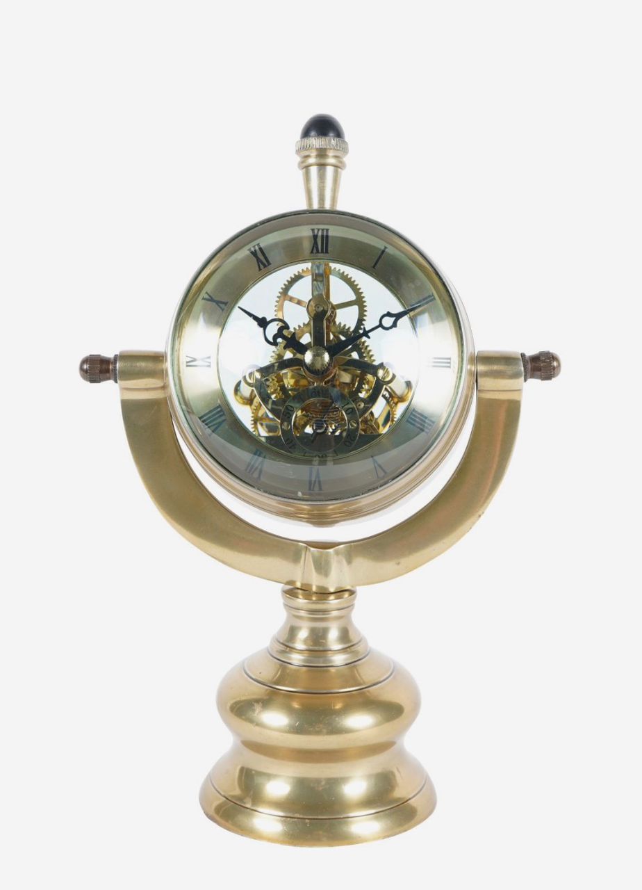 Columbia antique brass finish mantle clock with Roman numerals and visible cogs