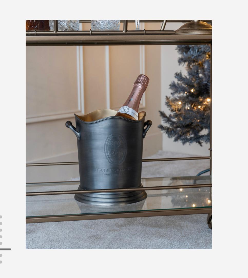 Cramant wine cooler in brushed steel with brass interior