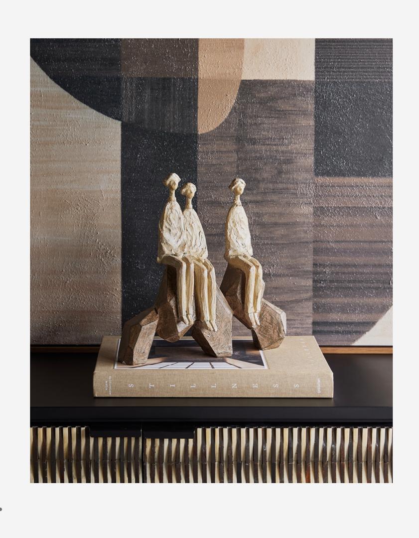 Ellington seated forms family of 3 sculptural resin figures