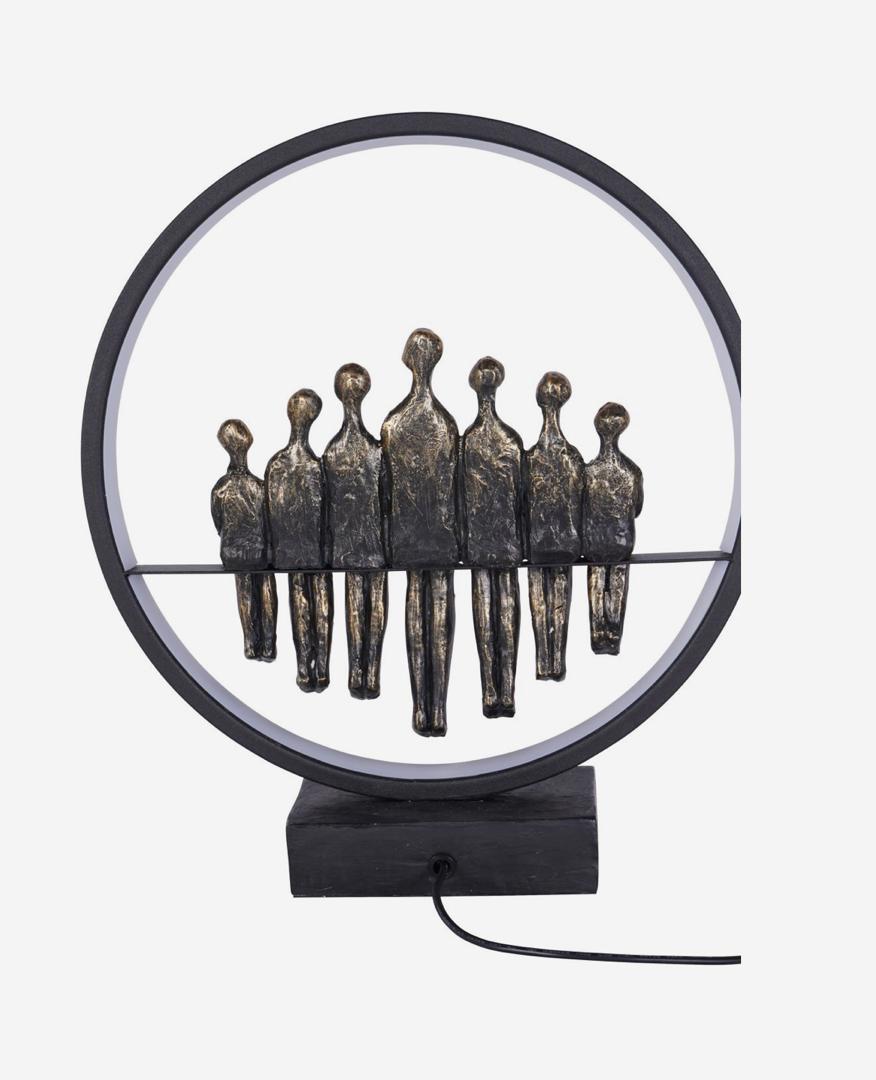 Family LED light sculpture with bronze figures and circular glow
