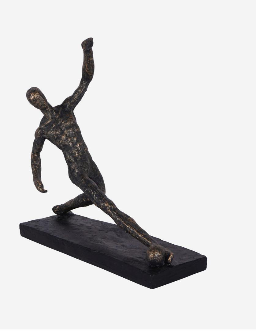 Football player sculpture in bronze with dynamic pose