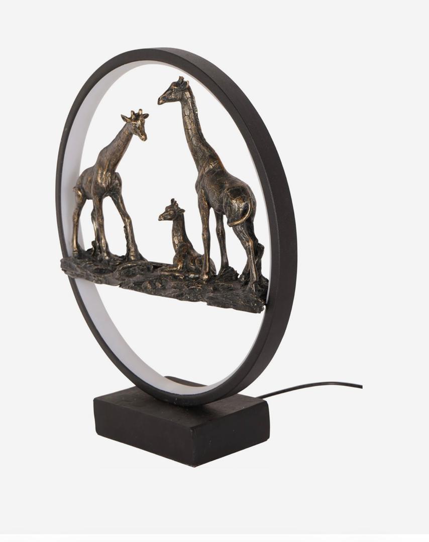 Giraffe family LED sculpture with bronze finish and circular light