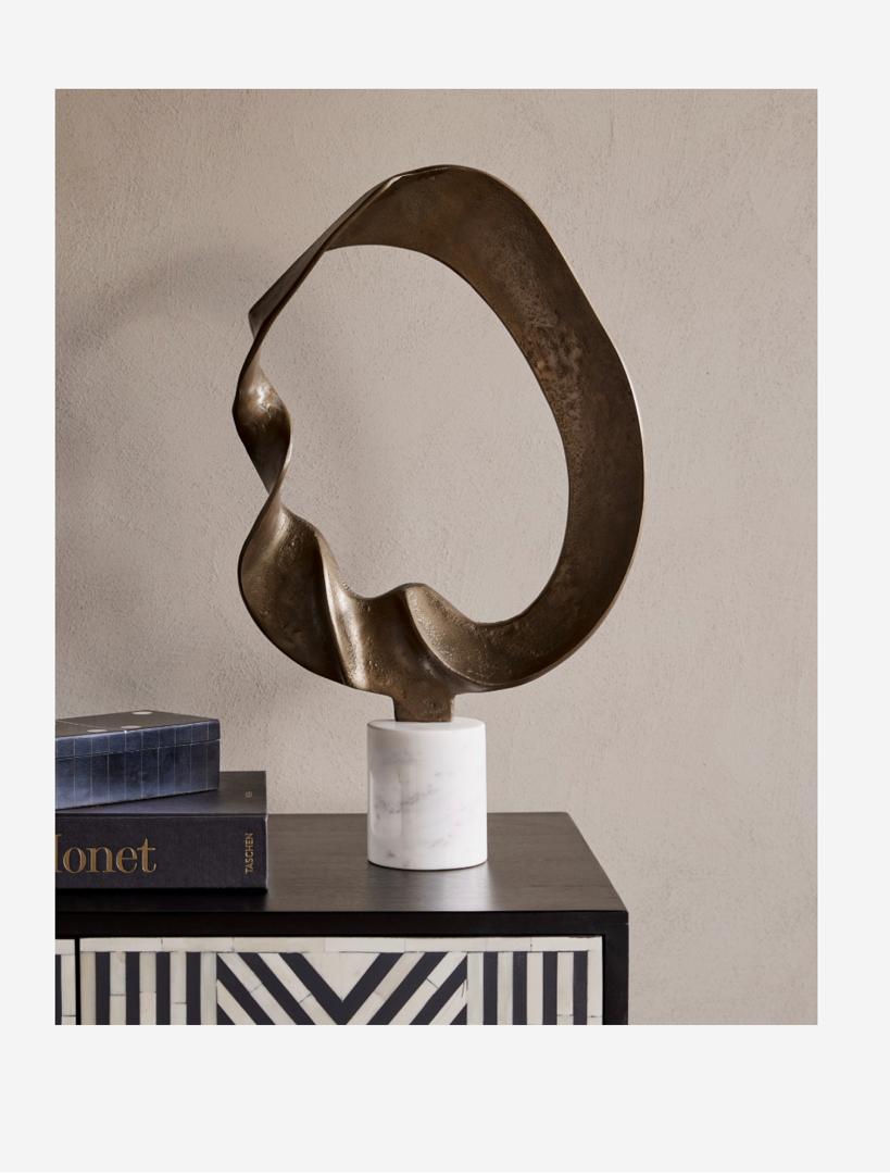 Kentford gold sculpture on marble base with abstract design