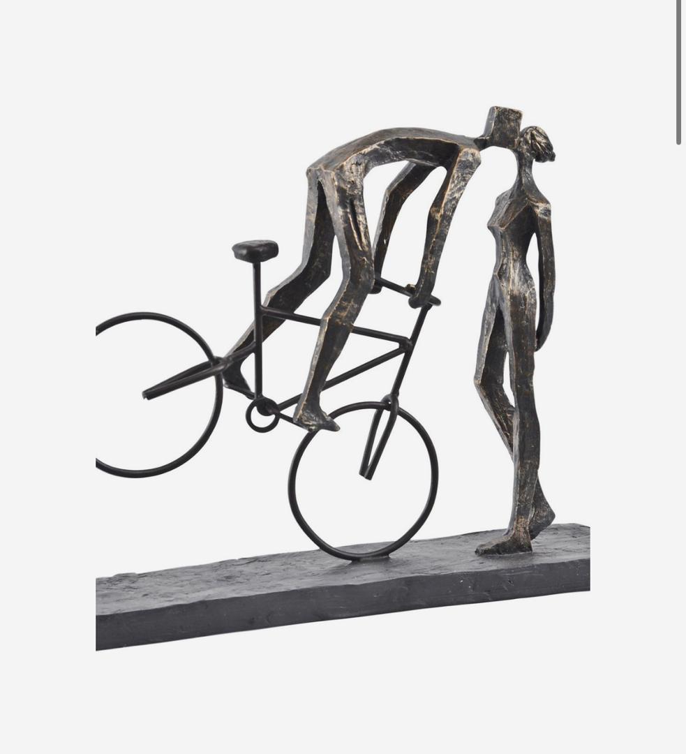 Kissing couple on bike sculpture in antique bronze finish