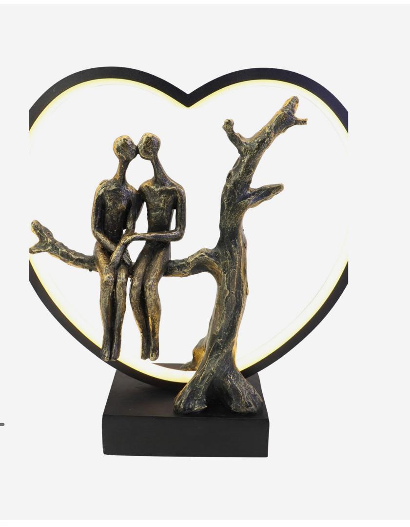 Lovers on branch LED sculpture with bronze finish and warm glow
