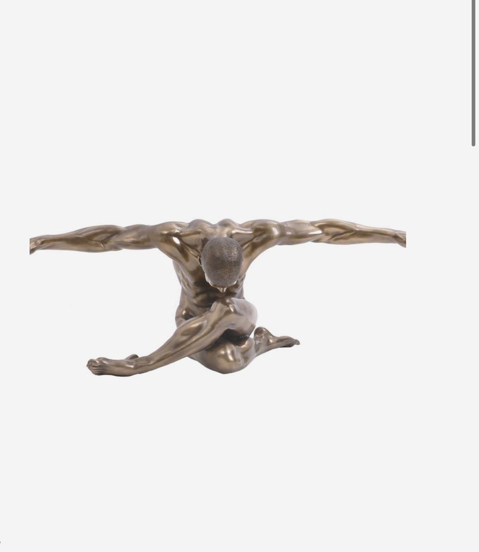 Keswick male sculpture with outstretched arms in bronze finish