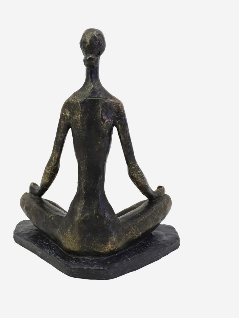 Yoga pose sculpture in bronze finish with serene female figure
