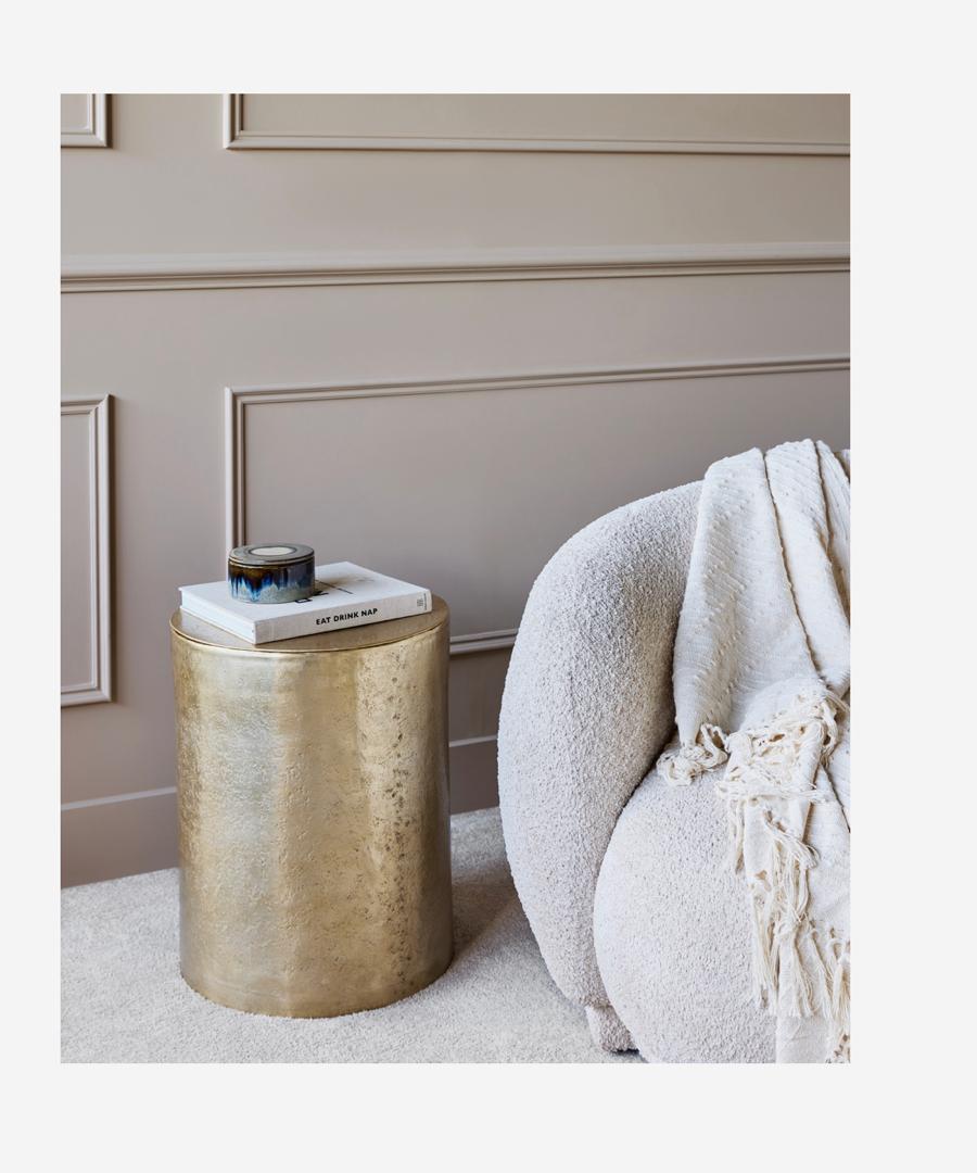 Zander champagne gold metal side table with hidden storage lid